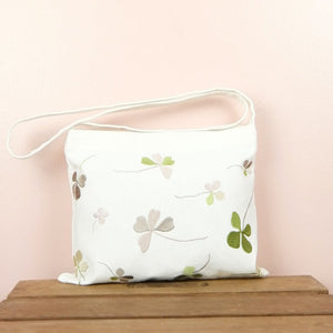 Clover Leaves on Natural Canvas Small Sling Bag - image