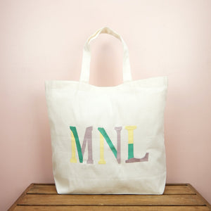 MNL (Manila) on Natural Canvas Shopping Tote - image