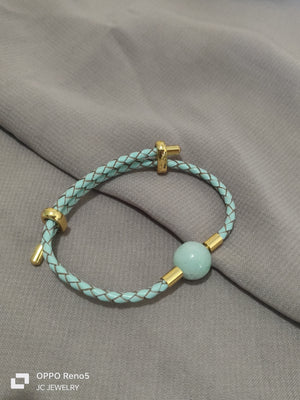 Light  green two tone jade bracelet - image