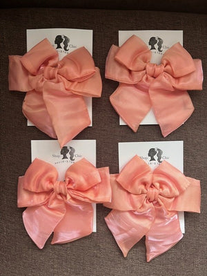 Peach curly bow - image