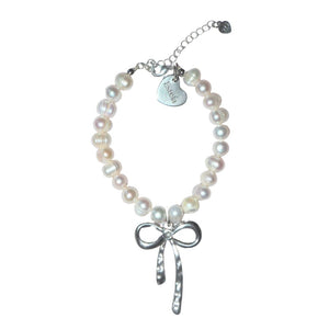 Pearl bracelet with silver bow charm - image