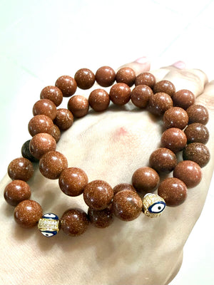 evil eye sandstoneGold - image