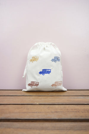 Jeepney on Light Canvas Medium Drawstring Pouch - image
