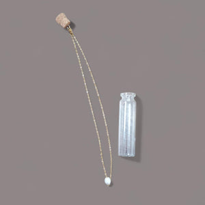 Pearl in a bottle - image