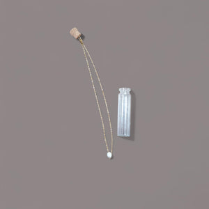 Pearl in a bottle - image
