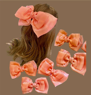 Peach curly bow - image