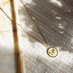 Matte World Map Necklace - image